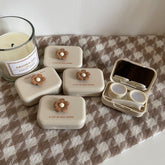 Estuche para lentes de contacto de color cálido con té con leche